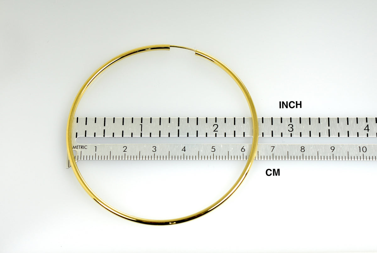 14k yellow gold round endless hoop earrings 64mm x 2mm