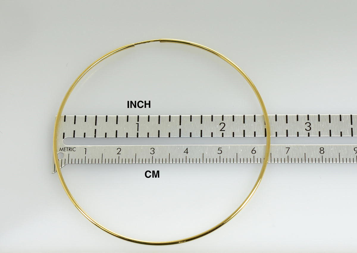 14k yellow gold extra large endless round hoop earrings 65mm x 1.20mm