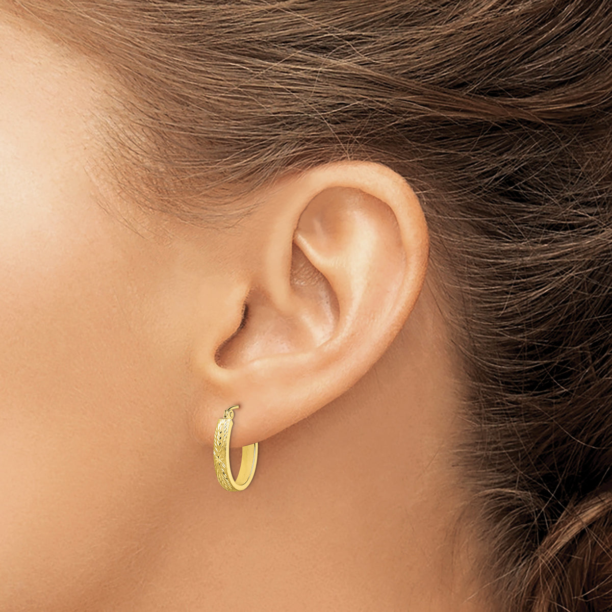 10K Yellow Gold 19mm x 13mm x 1.4mm Diamond Cut Brushed Oval Hoop Earrings
