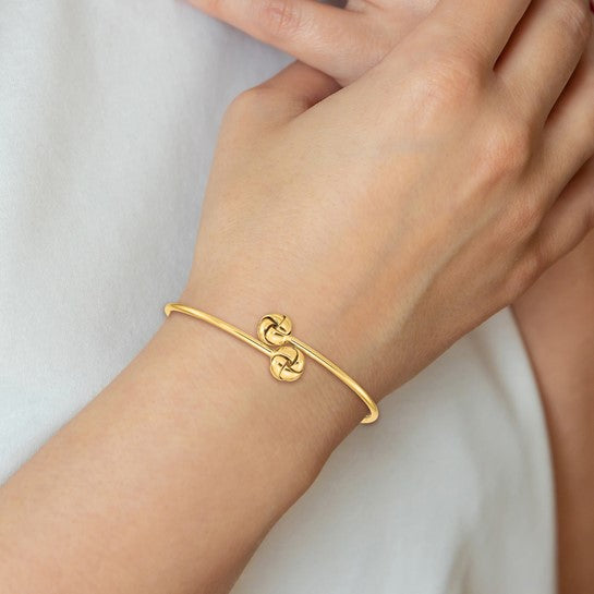 14k yellow gold love knot flexible slip on cuff bangle bracelet
