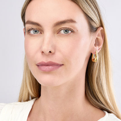 14k yellow gold puffed graduated oval hoop earrings