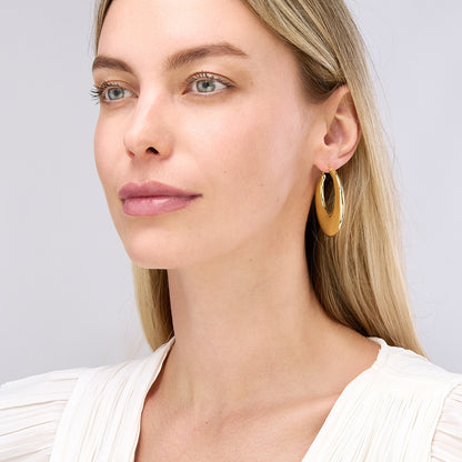 14k yellow gold large graduated round puffed hoop earrings