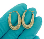 Load image into Gallery viewer, 10K Yellow Gold Shrimp Oval Twisted Classic Textured Hoop Earrings 25mm x 17mm

