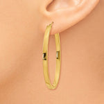 Load image into Gallery viewer, 14k Yellow Gold Classic Large Oval Hoop Earrings 40mm x 23mm x 3mm
