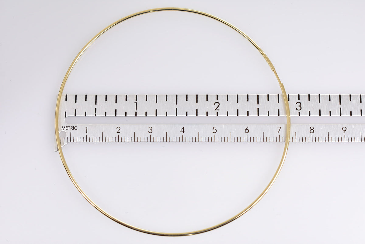 10k yellow gold extra large round endless hoop earrings 68mm x 2mm