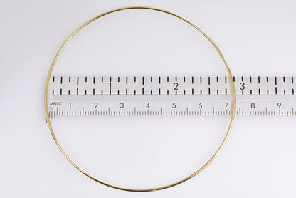 10k yellow gold extra large round endless hoop earrings 68mm x 2mm