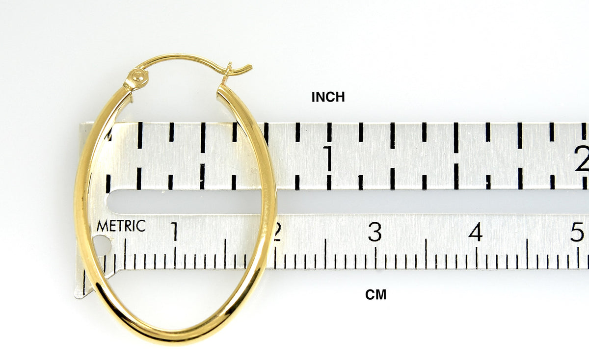 14k yellow gold classic polished oval hoop earrings 29mm x 21mm x 3mm