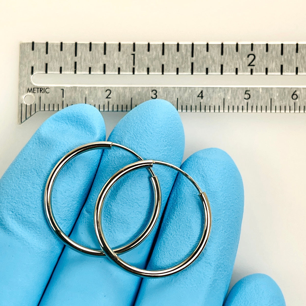 14k white gold classic endless round hoop earrings 21mm x 1.5mm