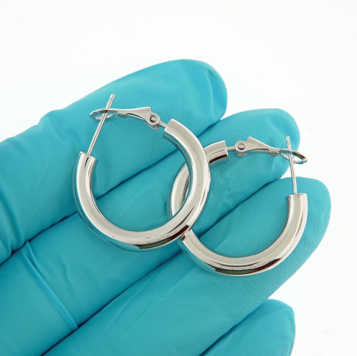 14k white gold round omega back hoop earrings 22mm x 4mm