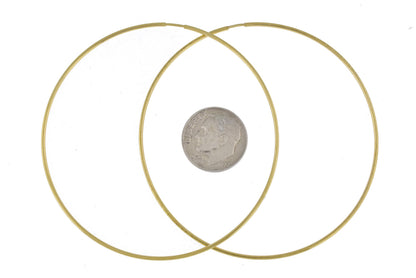 14k yellow gold extra large endless round hoop earrings 65mm x 1.20mm