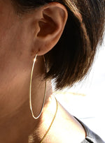 Load image into Gallery viewer, 14k Yellow Gold Extra Large Endless Round Hoop Earrings 70mm x 1.20mm
