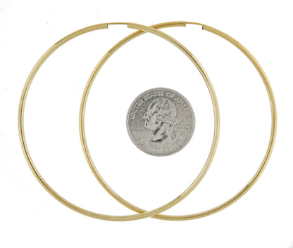 14k yellow gold extra large classic endless hoop earrings 72mm x 2mm