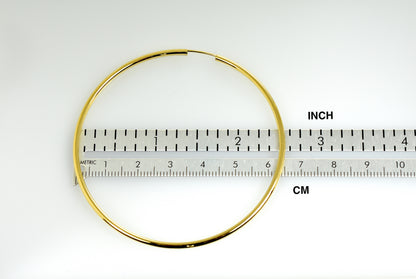 14k yellow gold round endless hoop earrings 64mm x 2mm