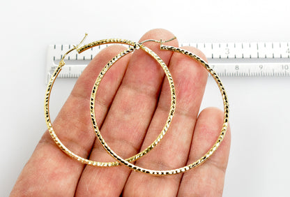 14k yellow gold diamond cut classic round hoop earrings 50mm x 2mm