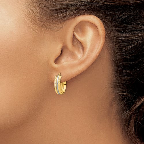 14k yellow gold and rhodium diamond cut grooved oval hoop earrings 15mm x 5.75mm