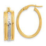 Load image into Gallery viewer, 14K Yellow Gold and Rhodium Diamond Cut Grooved Oval Hoop Earrings 18mm x 7mm
