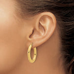 Load image into Gallery viewer, 14k Yellow Gold Oval Hoop Earrings 30mm x 20mm
