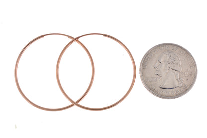 14k rose gold classic endless round hoop earrings 33mm x 1.25mm