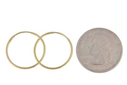 14k yellow gold round endless hoop earrings 17mm x 1.25mm