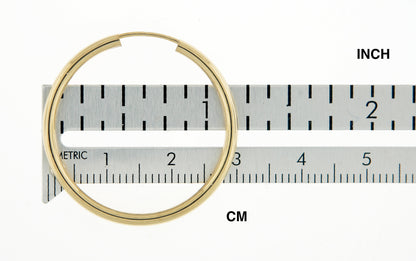 14k yellow gold round endless hoop earrings 30mm x 2mm
