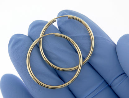 14k yellow gold round endless hoop earrings 30mm x 2mm