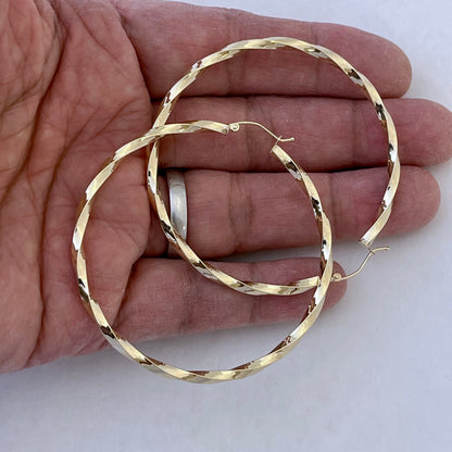 14k yellow gold twisted modern classic round hoop earrings 60mm x 3mm