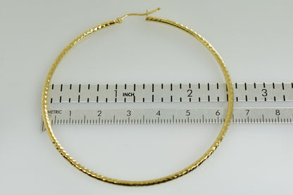 14k yellow gold diamond cut classic round hoop earrings 65mm x 2mm