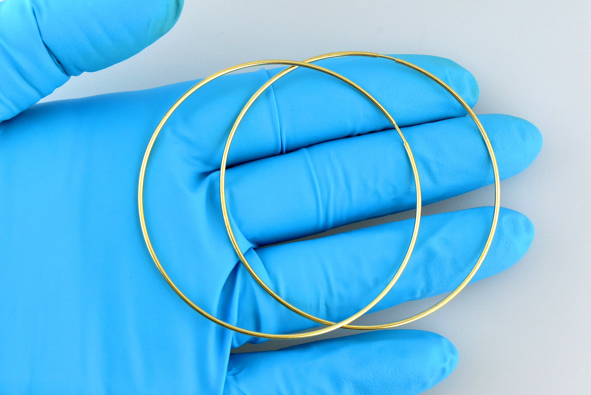 14k yellow gold extra large endless round hoop earrings 65mm x 1.20mm